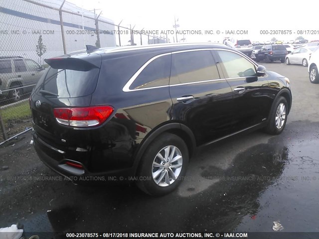 5XYPGDA32GG106058 - 2016 KIA SORENTO LX/L BLACK photo 4