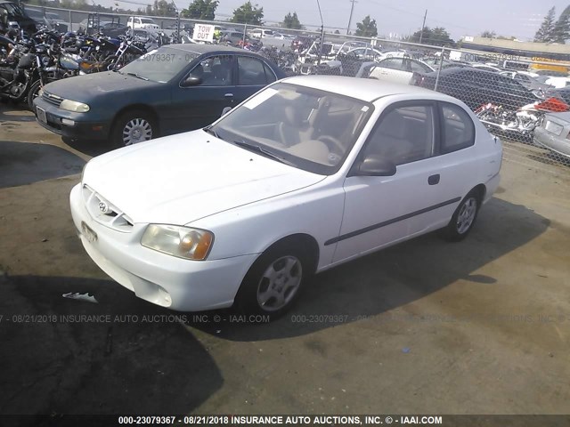 KMHCF35G51U100720 - 2001 HYUNDAI ACCENT WHITE photo 2