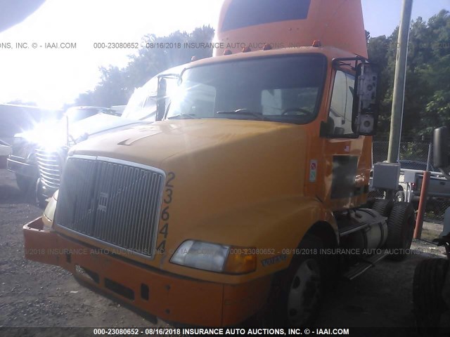 4V4M19RF42N319244 - 2002 VOLVO VNM M ORANGE photo 2