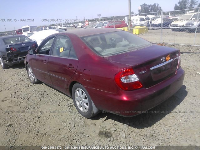 JTDBE32K230185070 - 2003 TOYOTA CAMRY LE/XLE RED photo 3