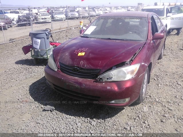 JTDBE32K230185070 - 2003 TOYOTA CAMRY LE/XLE RED photo 6