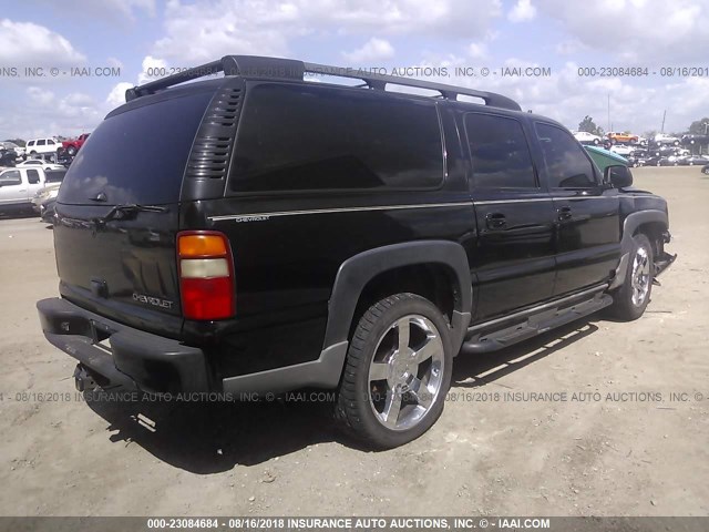 3GNFK16TX3G122349 - 2003 CHEVROLET SUBURBAN K1500 BLACK photo 4