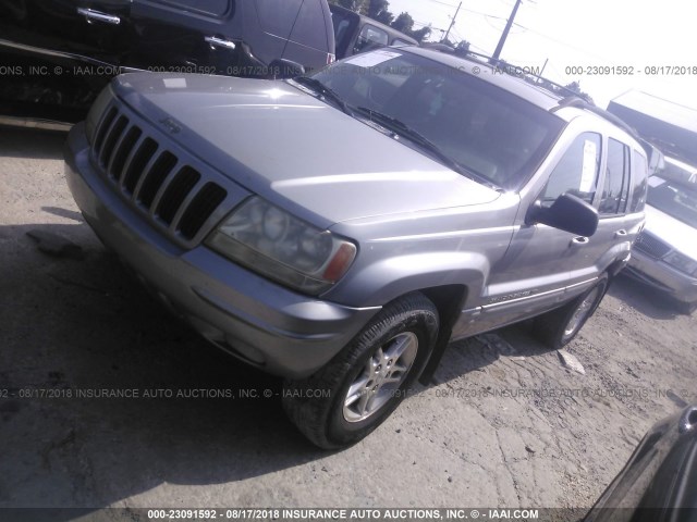 1J4GW58NXYC158067 - 2000 JEEP GRAND CHEROKEE LIMITED SILVER photo 2