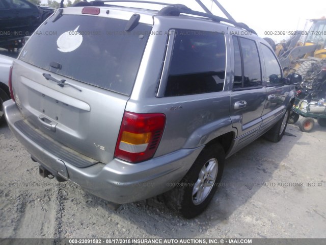 1J4GW58NXYC158067 - 2000 JEEP GRAND CHEROKEE LIMITED SILVER photo 4