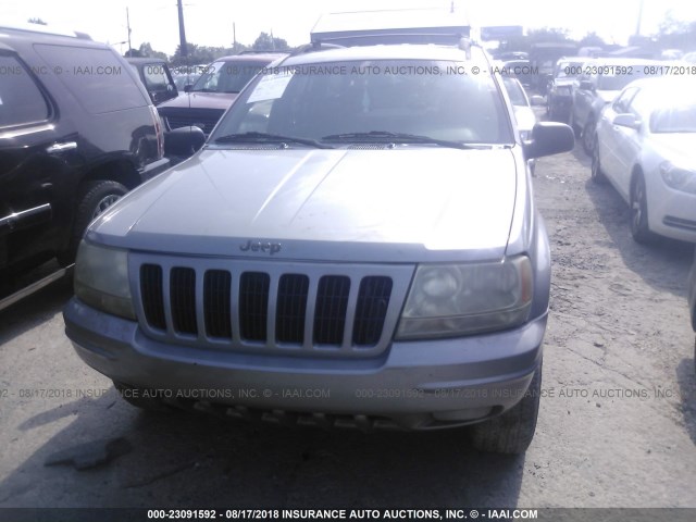 1J4GW58NXYC158067 - 2000 JEEP GRAND CHEROKEE LIMITED SILVER photo 6