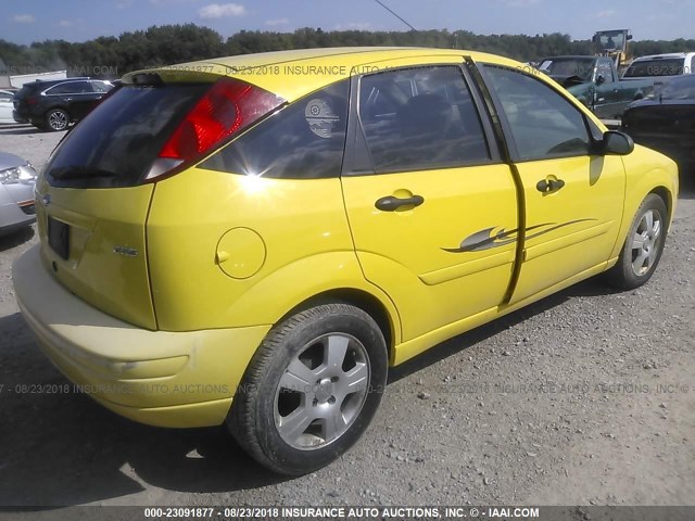 3FAFP37N65R122853 - 2005 FORD FOCUS ZX5 YELLOW photo 4