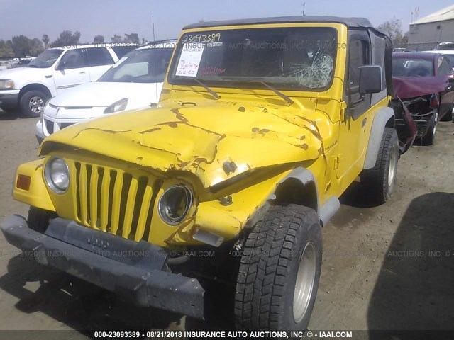 1J4FA29P7YP772141 - 2000 JEEP WRANGLER / TJ SE YELLOW photo 2