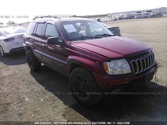 1J4GW58N21C720212 - 2001 JEEP GRAND CHEROKEE LIMITED RED photo 1