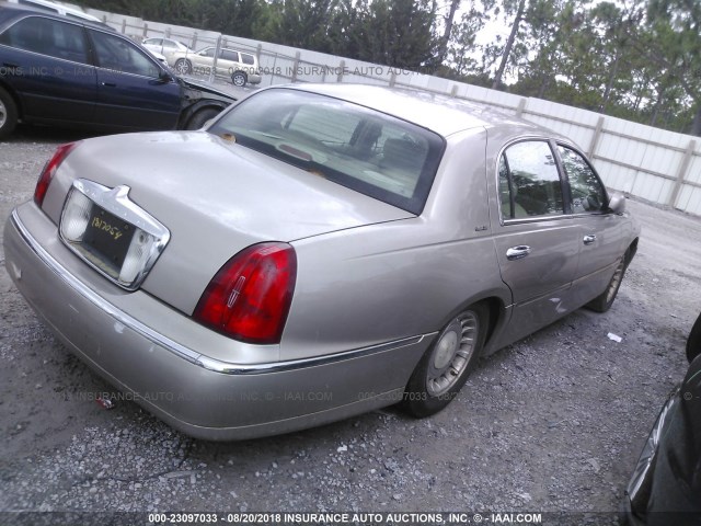 1LNHM81W31Y723798 - 2001 LINCOLN TOWN CAR EXECUTIVE Золотой фото 4