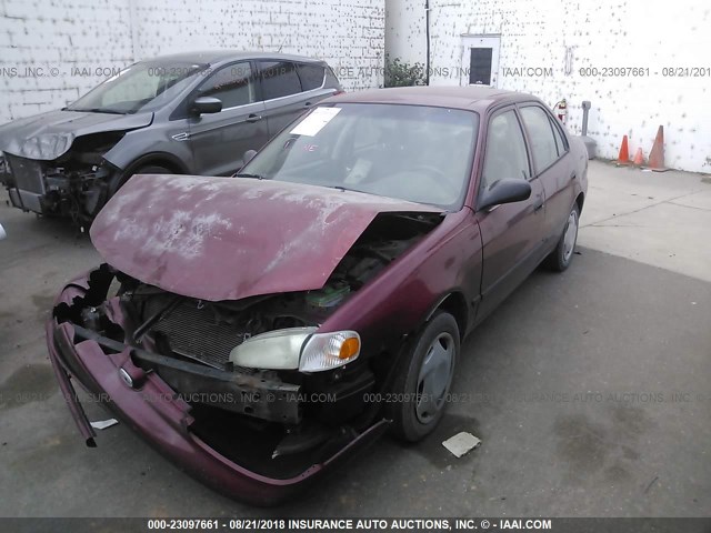 1Y1SK5281XZ405580 - 1999 CHEVROLET GEO PRIZM LSI RED photo 2