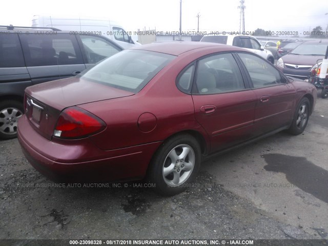 1FAFP53UXYA184263 - 2000 FORD TAURUS SE RED photo 4