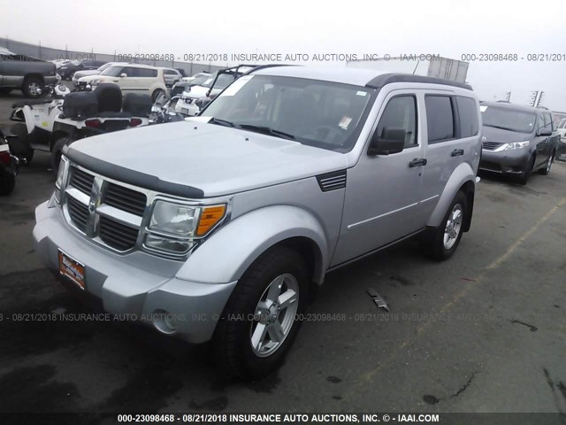 1D8GU58K17W567607 - 2007 DODGE NITRO SLT SILVER photo 2