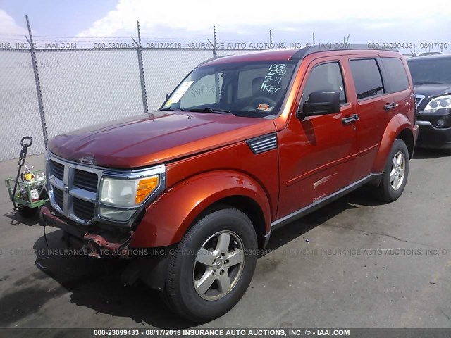 1D8GU28K69W513656 - 2009 DODGE NITRO SE ORANGE photo 2