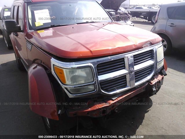 1D8GU28K69W513656 - 2009 DODGE NITRO SE ORANGE photo 6