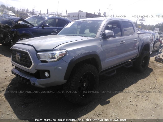 3TMCZ5AN7JM138000 - 2018 TOYOTA TACOMA DBL CAB/SR/TRDSPT/OR/PRO GRAY photo 2