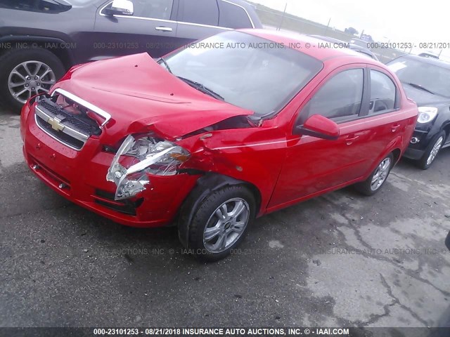 KL1TD5DE1BB139427 - 2011 CHEVROLET AVEO LS/LT წითელი ფოტო 2
