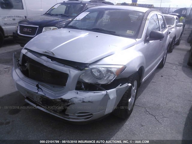 1B3CB1HA0BD254492 - 2011 DODGE CALIBER EXPRESS SILVER photo 2