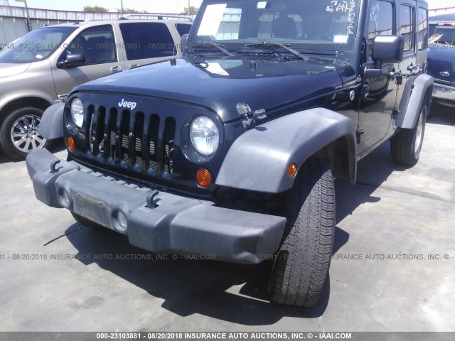 1C4HJWDG5CL182565 - 2012 JEEP WRANGLER UNLIMITE SPORT BLACK photo 6