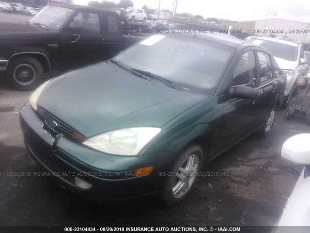 1FAFP3430YW136011 - 2000 FORD FOCUS SE/SE SPORT GREEN photo 2