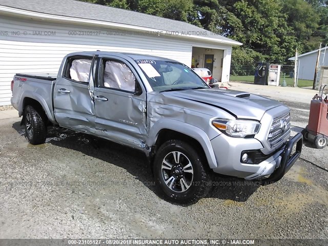 5TFCZ5AN9GX014202 - 2016 TOYOTA TACOMA DBL CAB/SR/SR5/TRD SPT/OR SILVER photo 1
