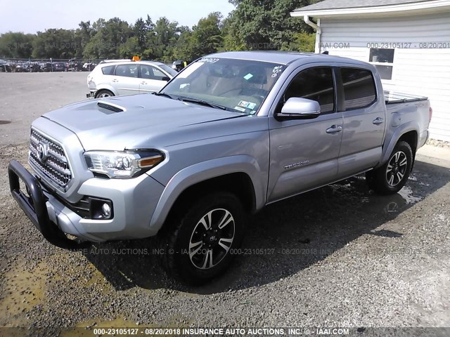 5TFCZ5AN9GX014202 - 2016 TOYOTA TACOMA DBL CAB/SR/SR5/TRD SPT/OR SILVER photo 2