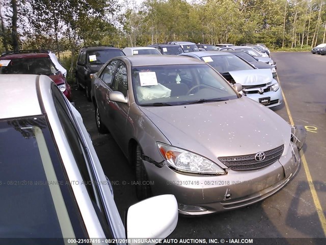 JTDBE32K630181622 - 2003 TOYOTA CAMRY LE/XLE GOLD photo 1