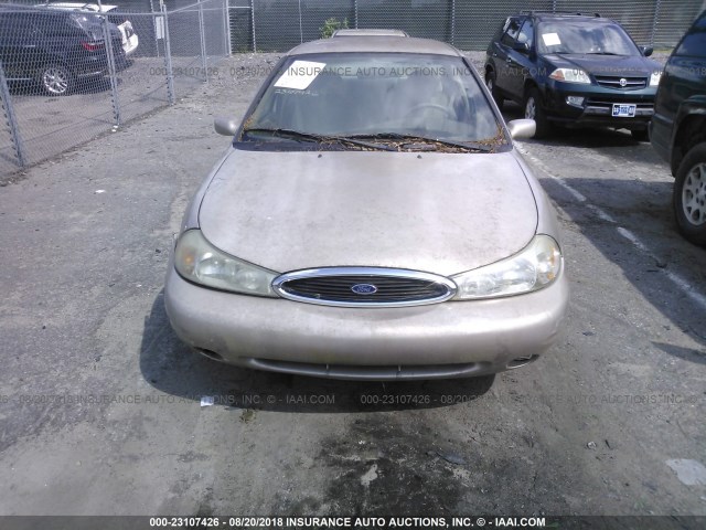 1FAFP6634XK231112 - 1999 FORD CONTOUR SE SILVER photo 6