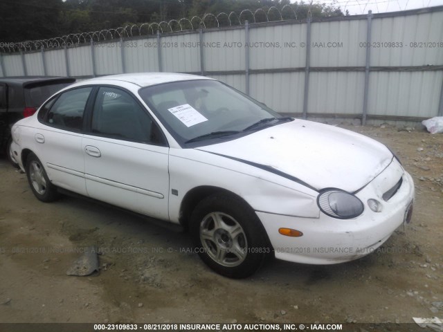 1FAFP53S8XA300945 - 1999 FORD TAURUS SE/COMFORT/SPORT WHITE photo 1