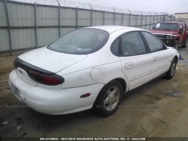 1FAFP53S8XA300945 - 1999 FORD TAURUS SE/COMFORT/SPORT WHITE photo 4