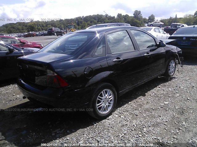 1FAFP34N87W117514 - 2007 FORD FOCUS ZX4/S/SE/SES BLACK photo 4