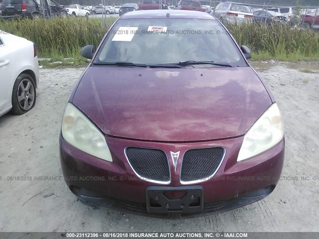 1G2ZG57BX94130255 - 2009 PONTIAC G6 BURGUNDY photo 6