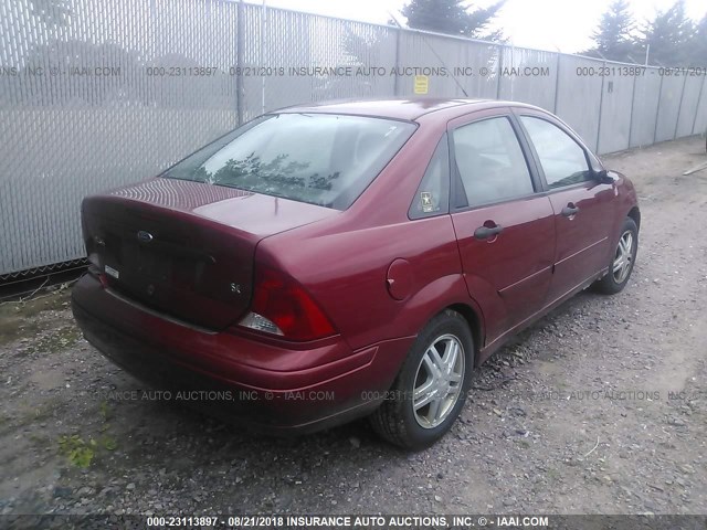 1FAFP343X4W112731 - 2004 FORD FOCUS SE COMFORT/SE SPORT RED photo 4