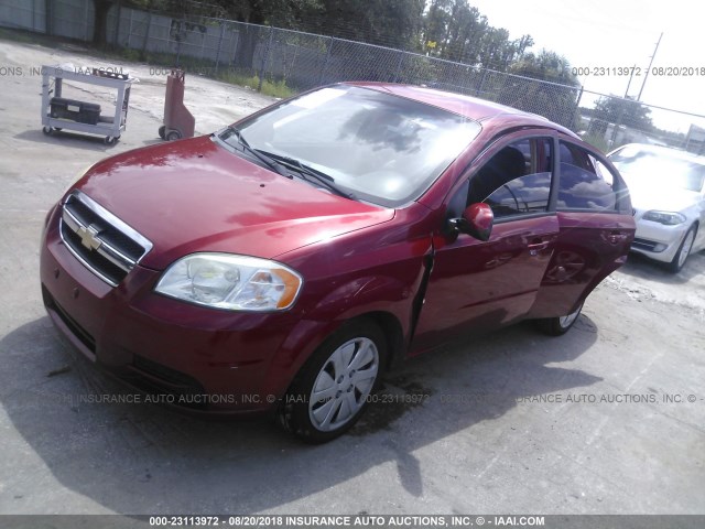 KL1TD5DE2BB152526 - 2011 CHEVROLET AVEO LS/LT წითელი ფოტო 2