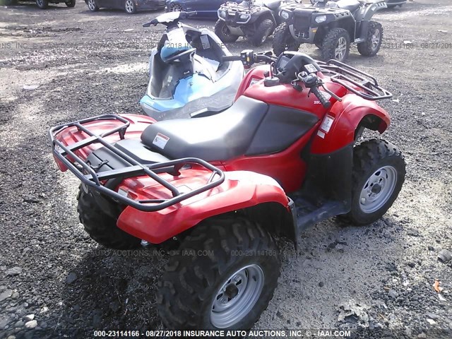 1HFTE3726D4400334 - 2013 HONDA TRX420 FPA RED photo 4