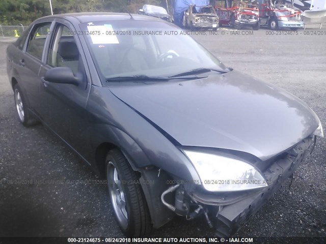 1FAHP34N97W207442 - 2007 FORD FOCUS ZX4/S/SE/SES GRAY photo 1