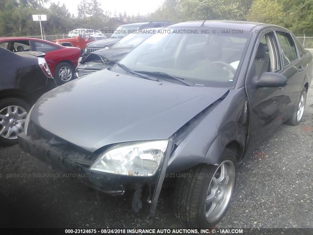 1FAHP34N97W207442 - 2007 FORD FOCUS ZX4/S/SE/SES GRAY photo 2