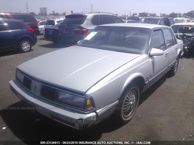 1G3HY54CXKW321217 - 1989 OLDSMOBILE DELTA 88 ROYALE BROUGHAM SILVER photo 2