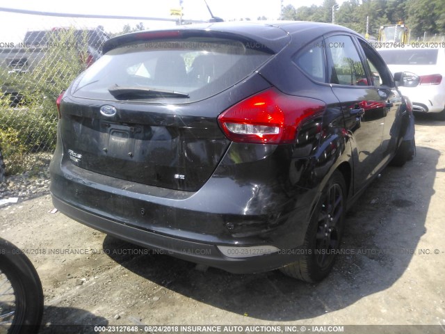 1FADP3K25GL273320 - 2016 FORD FOCUS SE BLACK photo 4