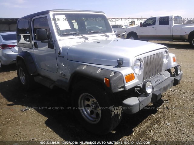 1J4FA49SX4P721338 - 2004 JEEP WRANGLER / TJ SPORT SILVER photo 1