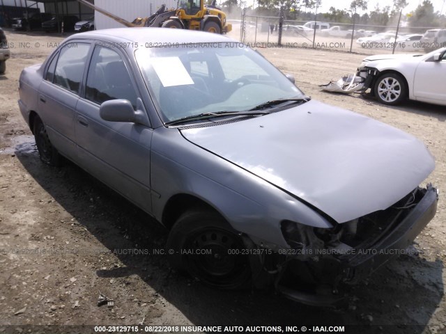 1NXBB02E0VZ568238 - 1997 TOYOTA COROLLA DX GRAY photo 1