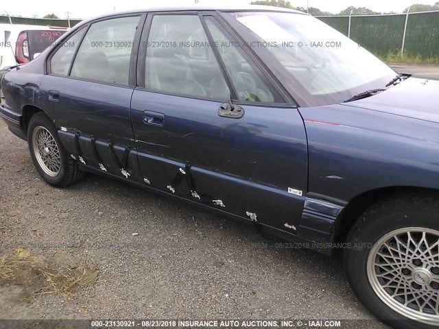 1G2HX52K6S4294269 - 1995 PONTIAC BONNEVILLE SE BLUE photo 6