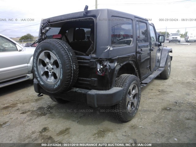 1C4BJWEG5JL813641 - 2018 JEEP WRANGLER UNLIMITE SAHARA BLACK photo 4