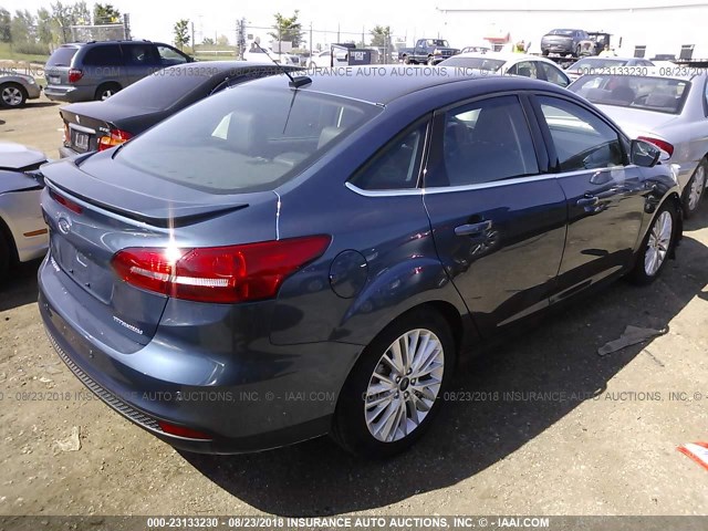 1FADP3J29JL227725 - 2018 FORD FOCUS TITANIUM BLUE photo 4