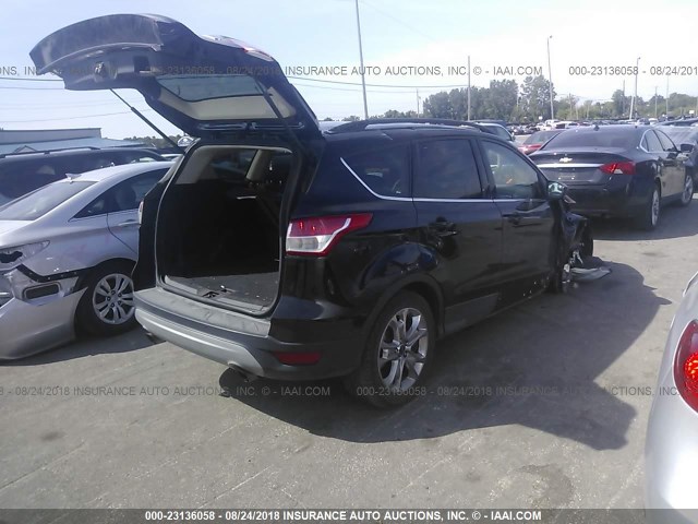 1FMCU9GX0GUA65552 - 2016 FORD ESCAPE SE BLACK photo 4