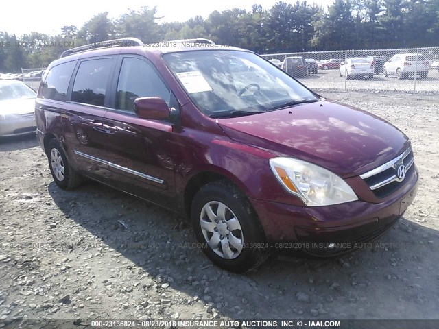 KNDMC233876029635 - 2007 HYUNDAI ENTOURAGE GLS/SE/LIMITED RED photo 1