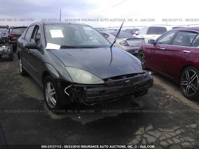 1FAFP38ZX4W138566 - 2004 FORD FOCUS ZTS GRAY photo 1