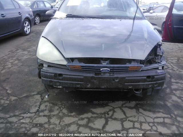 1FAFP38ZX4W138566 - 2004 FORD FOCUS ZTS GRAY photo 6