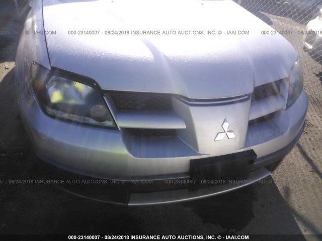 JA4LZ31FX4U051408 - 2004 MITSUBISHI OUTLANDER LS SILVER photo 6