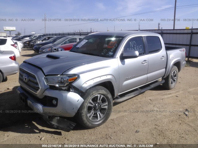 5TFCZ5AN0GX045760 - 2016 TOYOTA TACOMA DBL CAB/SR/SR5/TRD SPT/OR SILVER photo 2