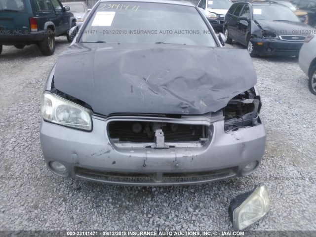 JN1DA31A83T407500 - 2003 NISSAN MAXIMA GLE/SE GOLD photo 6